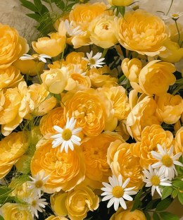 Close-up of cream-yellow spray roses, white chamomile daisies and fresh green foliage in textured ivory wrapping