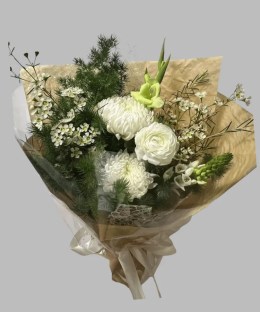 White chrysanthemums, ranunculus, green gladiolus, waxflower, and asparagus fern memorial bouquet