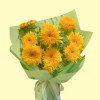Full plush double Teddy sunflowers with golden ruffled petals and fresh green wrapping