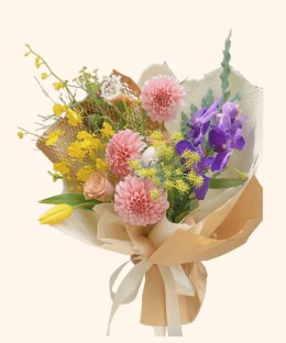 Full peach dahlias, purple phalaenopsis, yellow oncidium, butter tulip, apricot rose, and lace flower
