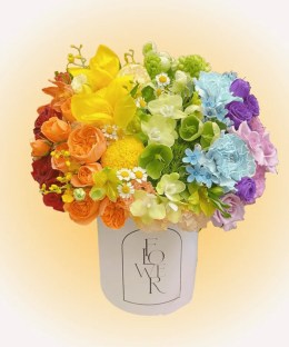 Pastel Spectrum Flower Hatbox with yellow tulips, orange garden roses, and green phalaenopsis orchids