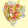 Full peach dahlias and roses, blush anthurium, pale-yellow gerbera, oncidium, lisianthus and white lace flower