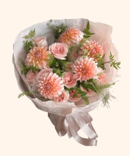 Full peach dahlias, blush roses, green filler, white lace flower, fountain grass, and ivory wrapping