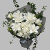 Double white Oriental lilies with buds and trailing greenery in grey wrapping