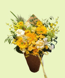 Full standard and Teddy Bear sunflowers with cream roses, oncidium orchids, snapdragons, green hydrangea, and white Ammi