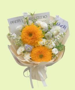 Full two Teddy Bear sunflowers with white lisianthus, campanula, chamomile, purple scabiosa, and eucalyptus