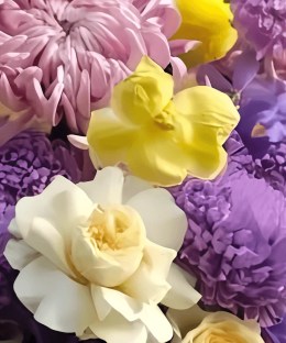 Close-up of lilac chrysanthemums, violet iris, purple hydrangea, yellow orchids, creamy roses, and bright yellow accents